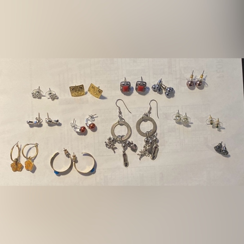13 pairs of earrings. All different.